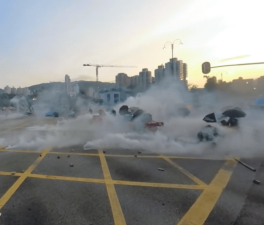 Protestors take cover from police tear gas canisters in a "protest-friendly" plaza in Hong Kong. Source: SITU research.