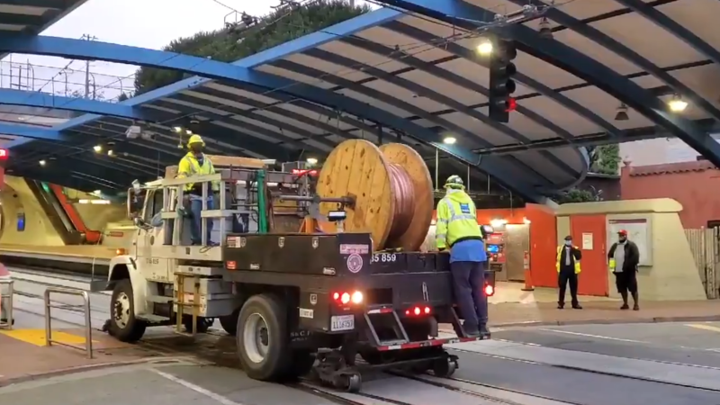 A Muni repair crew Monday morning at West Portal. Photo: Jeffrey Tumlin