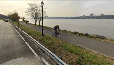 A cyclist recently on the Cherry Walk portion of the bike path through Riverside Park. Photo: Google.