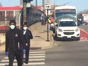 A short existing segment of bus lane on 79th Street by the Red Line station, with a cab in it. Photo: James Porter