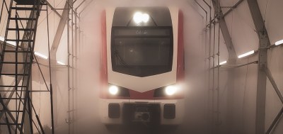 New rolling stock undergoing water testing last month (that's one of the real trains above). Photo: CalMod