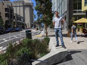 Greg Riessen proudly standing on one of the bioswell builbouts he helped plan on Folsom. Photos: Streetsblog/Rudick