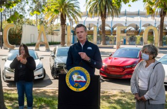 California Gov. Gavin Newsom speaks at a press conference on Wednesday, Sept. 23, 2020, at Cal Expo in Sacramento where he announced an executive order requiring the sale of all new passenger vehicles to be zero-emission by 2035, a move the governor says would achieve a significant reduction in greenhouse gas emissions. California would be the first state with such a rule, though Germany and France are among 15 other countries that have a similar requirement. (Daniel Kim/The Sacramento Bee via AP, Pool)