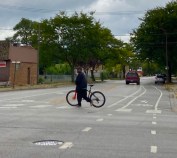 A person with a bike in Chicago's Roseland community. In recent years the city has been building more bikeways on the Far South Side, but the density of bikeways is still much greater in most of the North Side. Photo: John Greenfield