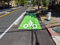 A section of concrete-protected bike lane on Milvia. Photos: Streetsblog/Rudick