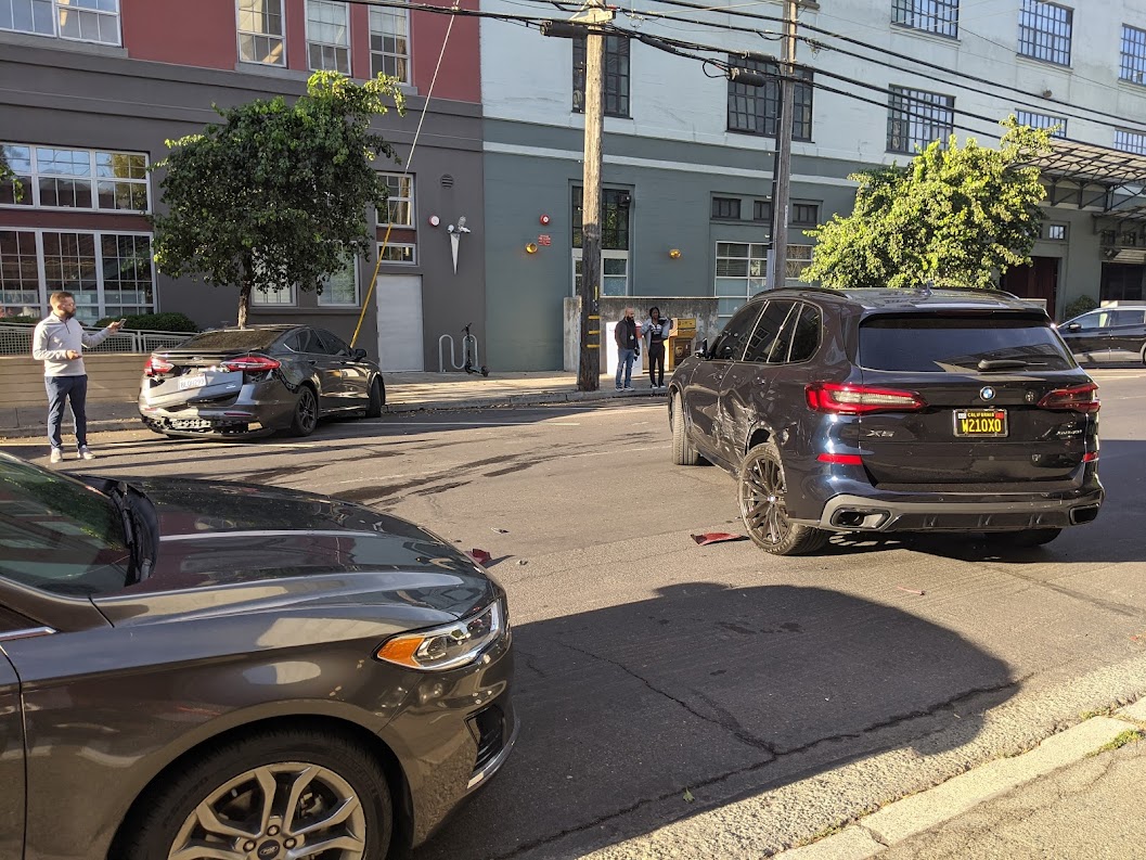 Two of the four cars involved in a wreck outside my window literally as I was writing this. Photo: Streetsblog/Rudick