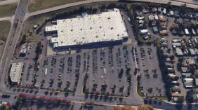 Aerial image of a half-empty Walmart parking lot. (Photo from Google Earth.)