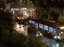 Muni buses backing up on Market Street before the intersection with Clayton. Note the Jeep being permitted to pass. Photo: Sprague Terplan