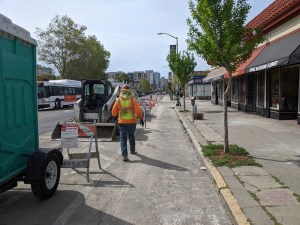 A construction worker walks along the temporarily closed bike lane on Telegraph. Photos: Streetsblog/Rudick