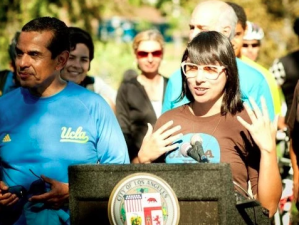 Adonia Lugo speaking in 2010 at the first CicLAvia open streets festival. Photo by CicLAvia