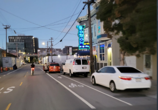 Bottom of the Hill, with a car parked in the bike lane. Photo: Cliff Bargar