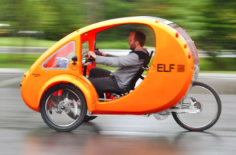 This vehicle has pedals, a battery-powered motor, three wheels, and a top speed of 20 miles per hour. So is it an "e-bike"? Photo: Electrek